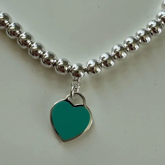 Tiffany & Co. Silver Bracelet with Teal Heart Charm - Picture 3 of 6